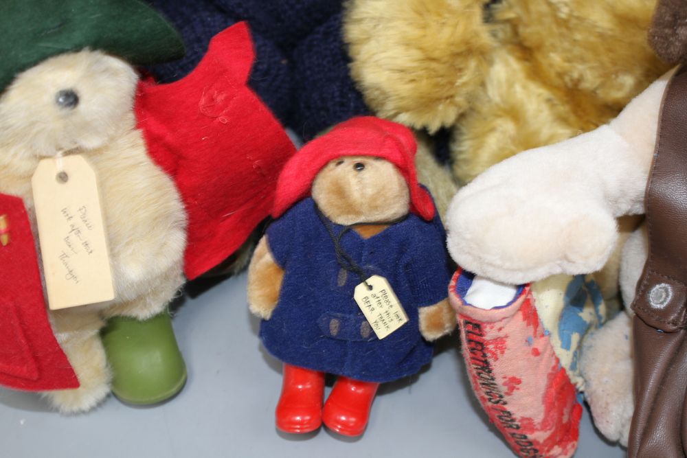 A Baloo pyjama case, a Schoolboy Scout Gromet, a Gund Winnie The Pooh, three small Paddingtons and a bear